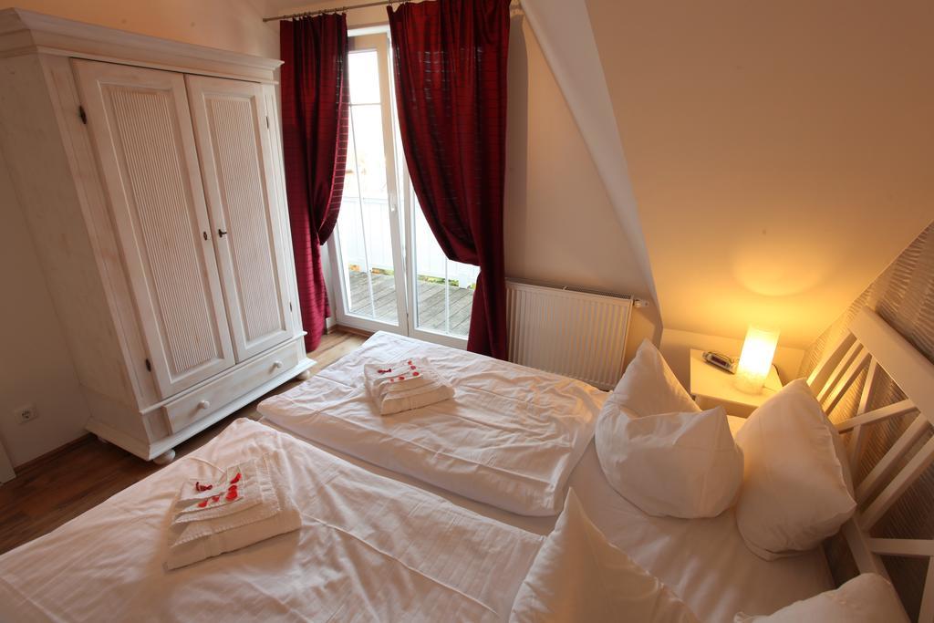Aparthotel Haus Amo Solem Dierhagen Habitación foto